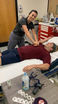 Dr. Scott Tolan needing CPR from Dr. Dana Rosu after his stress test - it's harder than it looks!