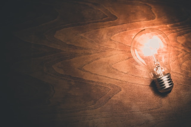 Lightbulb lit up on a table