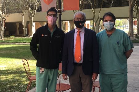three doctors standing outside for picture