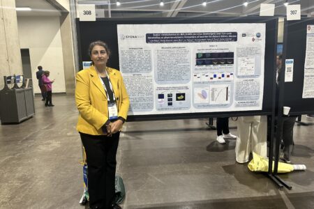 Woman presenting her work at the poster board sessions