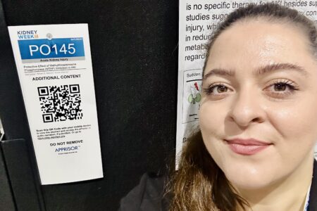 A close up of a researcher with her work at ASN Kidney Week