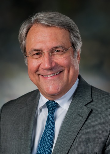 Dr. Jean-Louis Caron smiling for his staff photo.