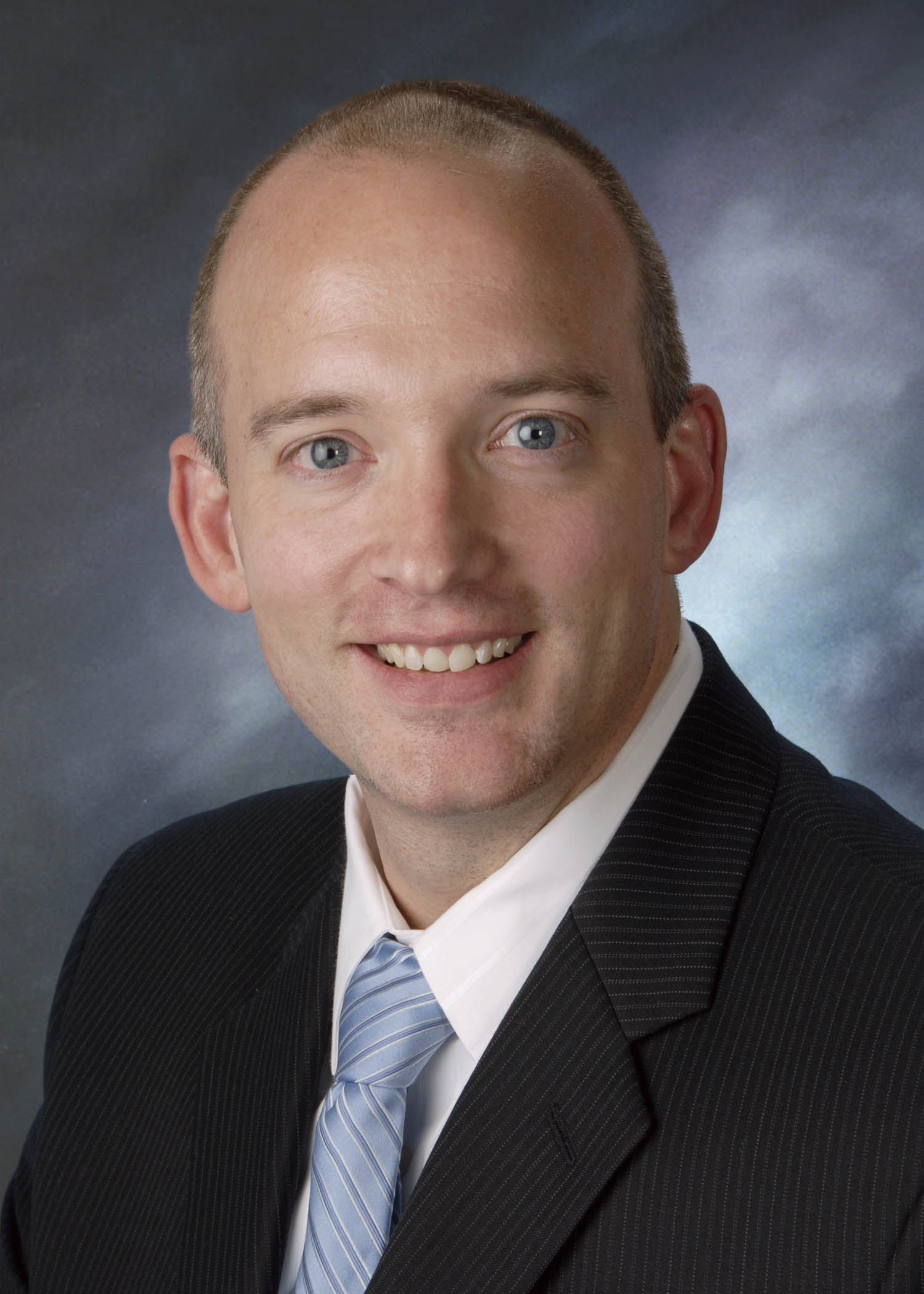 Dr. John Floyd smiling for his staff photo.
