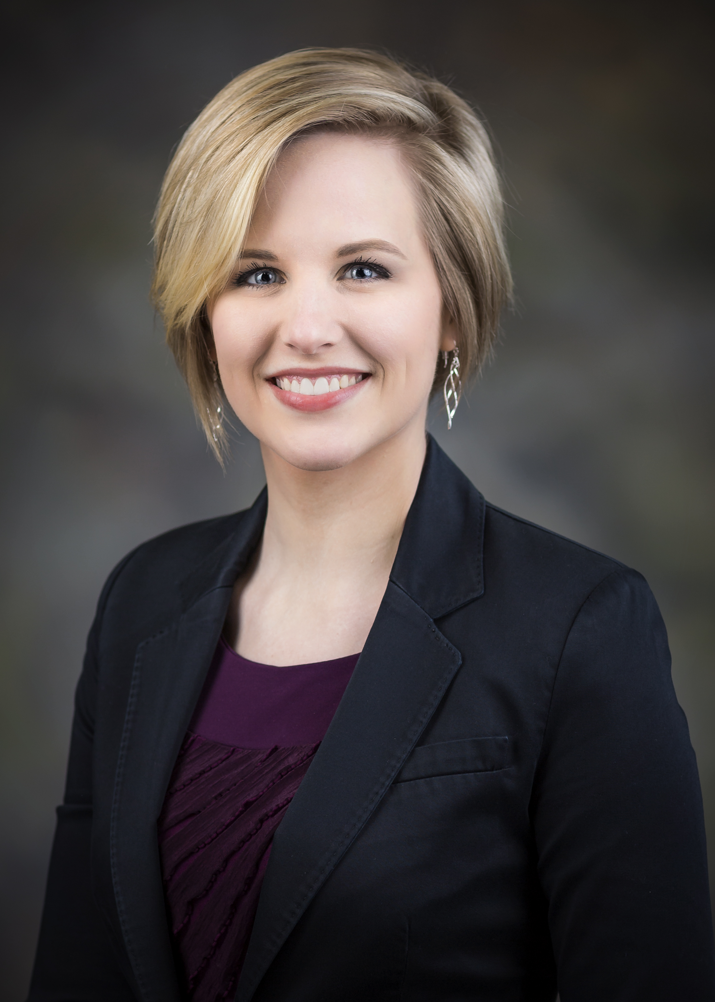 Graduate Student Kristi Guerrero smiles for her staff photo.