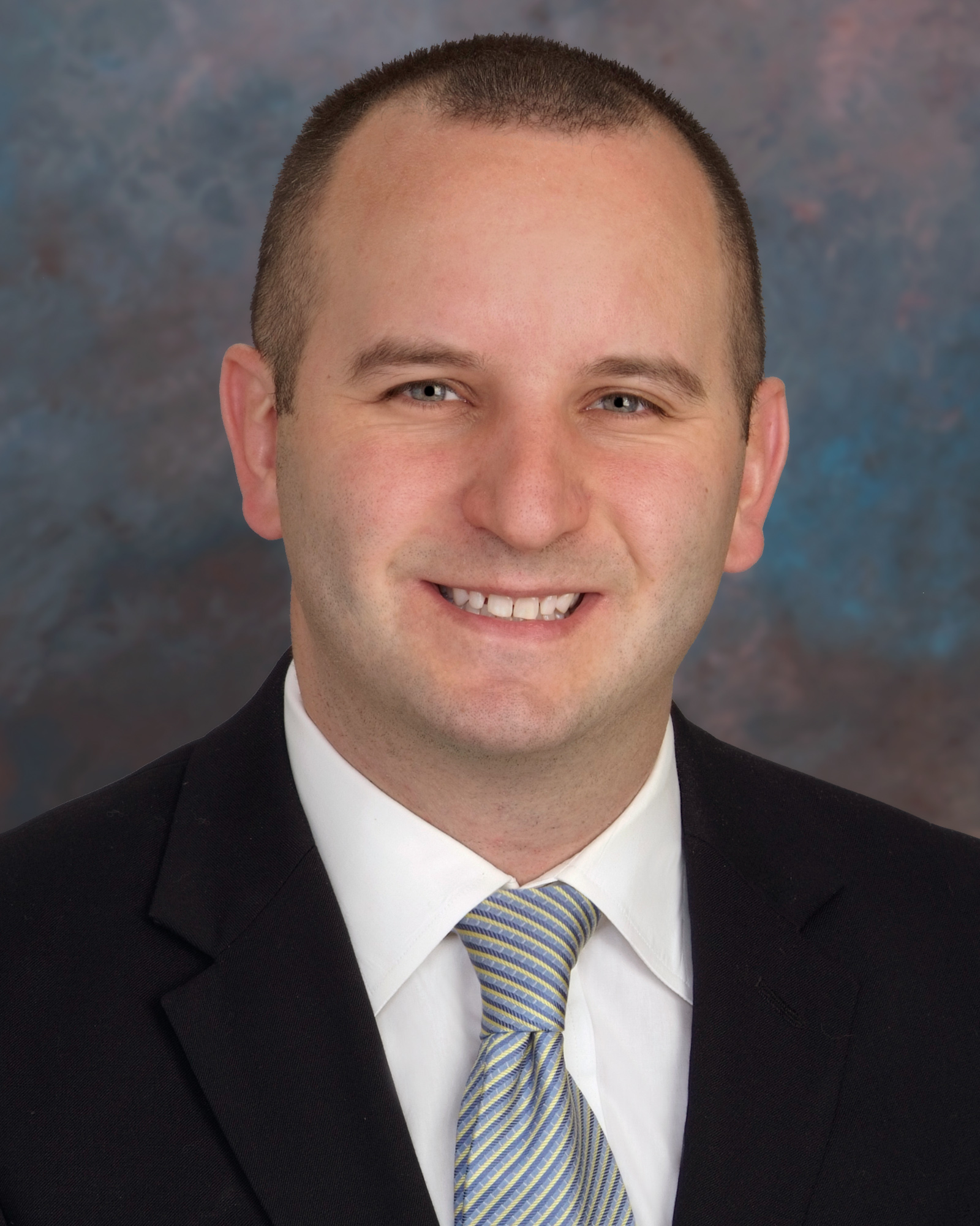 Dr. Justin Robert Mascitelli smiling for his staff photo.