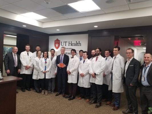 Residents and faculty stand with Dr. Lawton.
