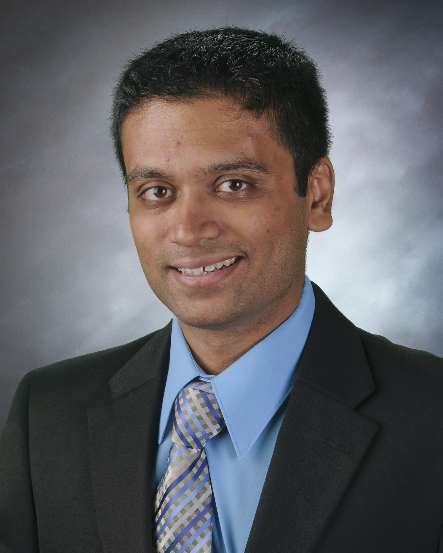 Dr. Vaibhav Patel smiling for his staff photo.