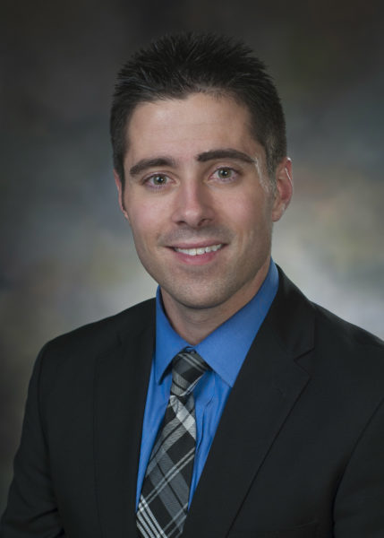 Dr. Derek Samples smiling for his staff photo.