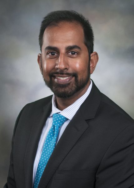 Dr. Shaherya Hafeez smiling for his staff photo.