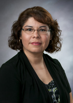 Sylvia Ibarra smiling for her staff photo.