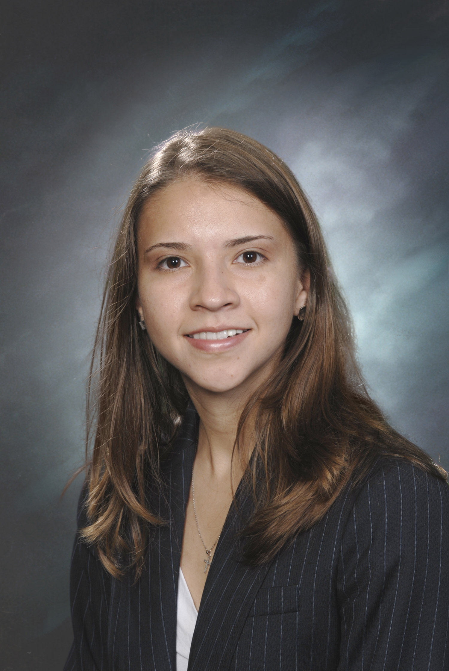 Feature image Veronica Toudouze smiling for her staff photo.
