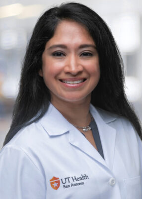 Denise Rios smiles for her staff photo.