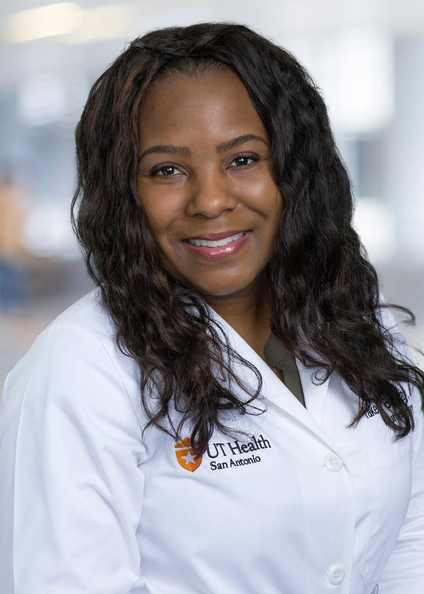 Feature image Takesha Barclay smiling for her staff photo.
