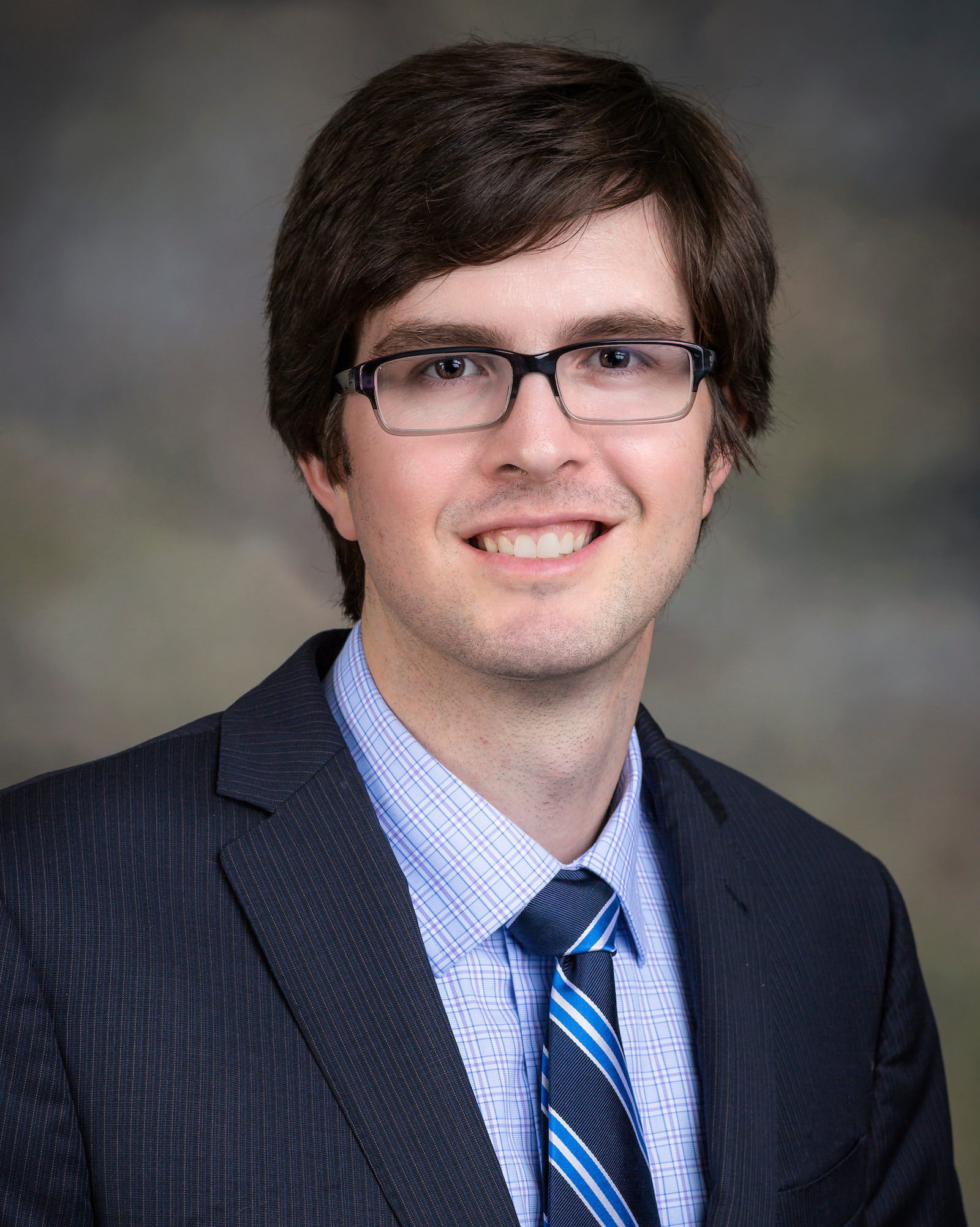 Feature image Dr. Michael McGinity smiling for his staff photo.