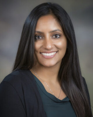 Dr. Vaidehi Mahadev smiling for her staff photo.