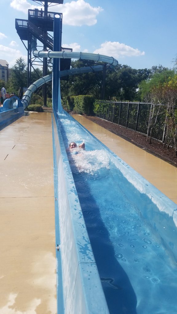 Someone using the waterslide at the 2019 Welcome Reception