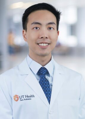 Dr. Chen smiles for headshot.
