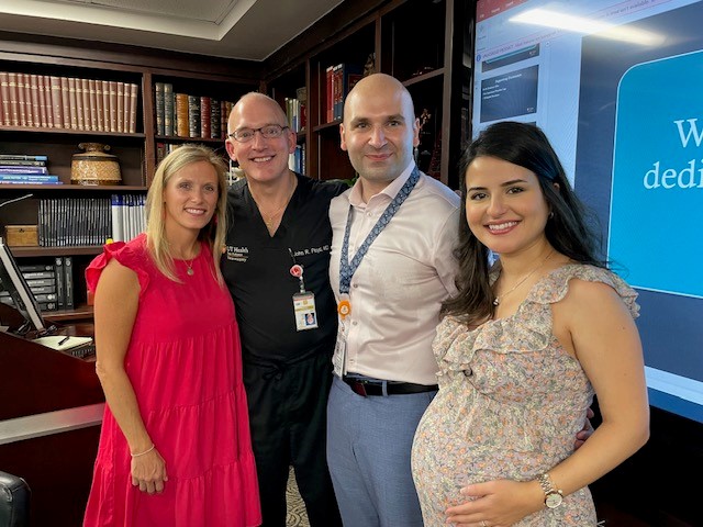 Dr. Al-Saiegh and his wife, Sally, pose for a photo at their baby shower.