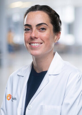 Dr. Scanlon poses for her staff portrait.