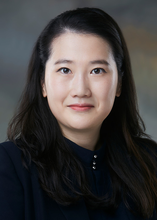 Hyeju Jeon smiles for her staff portrait.