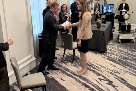 Dr. Lafuente accepts TANS award.