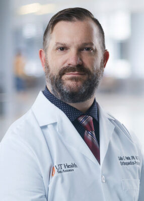 Dr. Pehde in lab coat