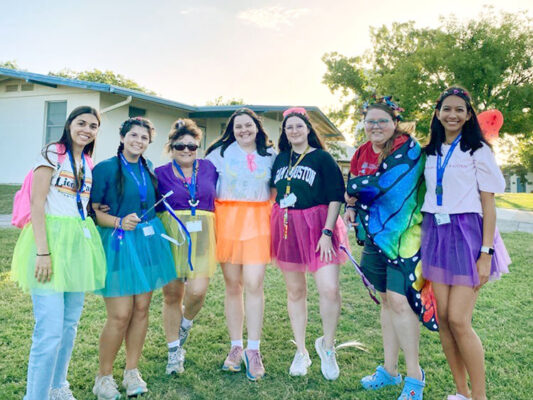 Texas Lions Camp 2025 Counselors standing on grass ground
